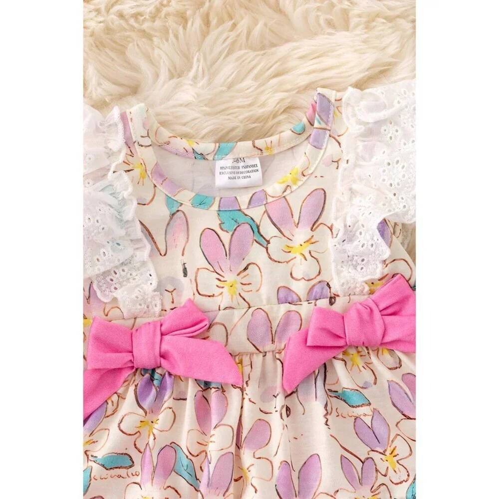 Lilac, blue & fuchsia twirl onesie with side bows. RPG50210 SOL